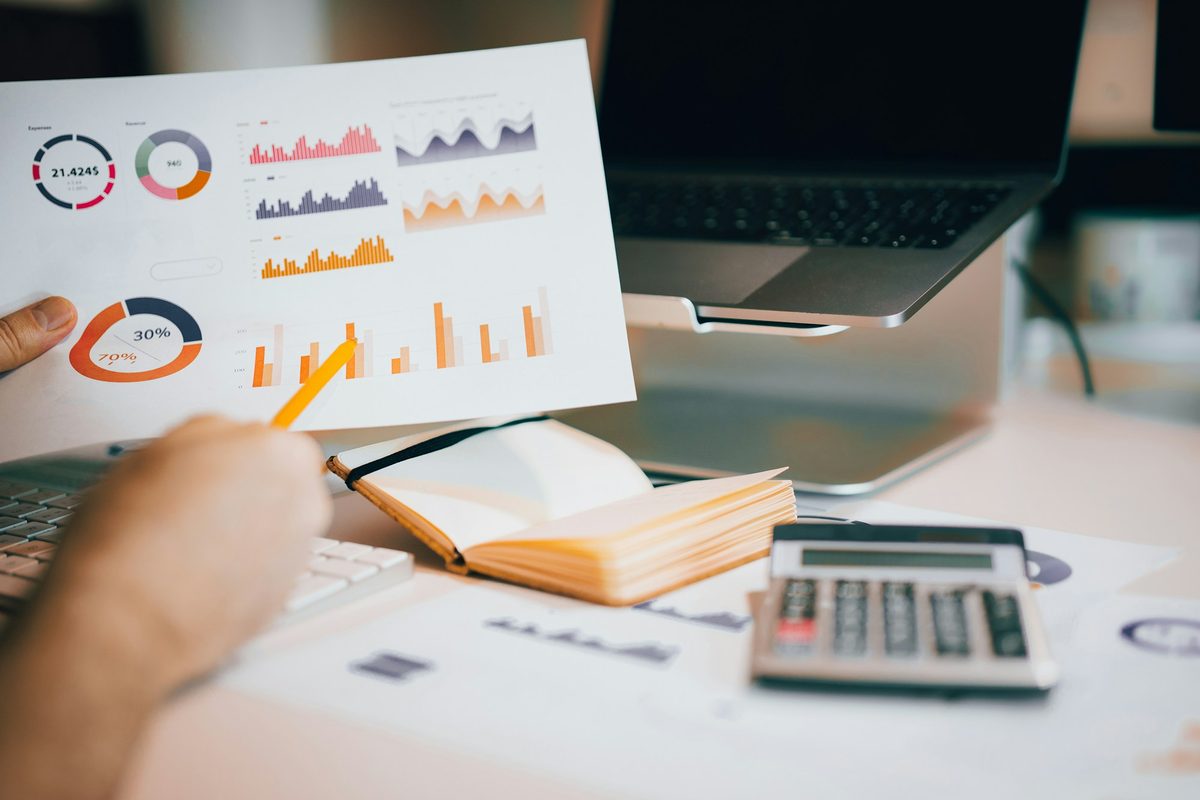 Printed results report with charts on a desk